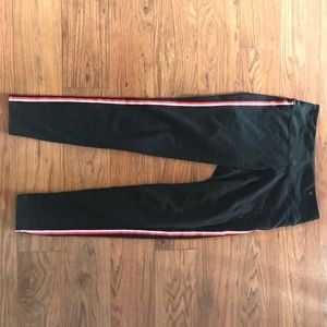 Orange athletic stripped leggings.